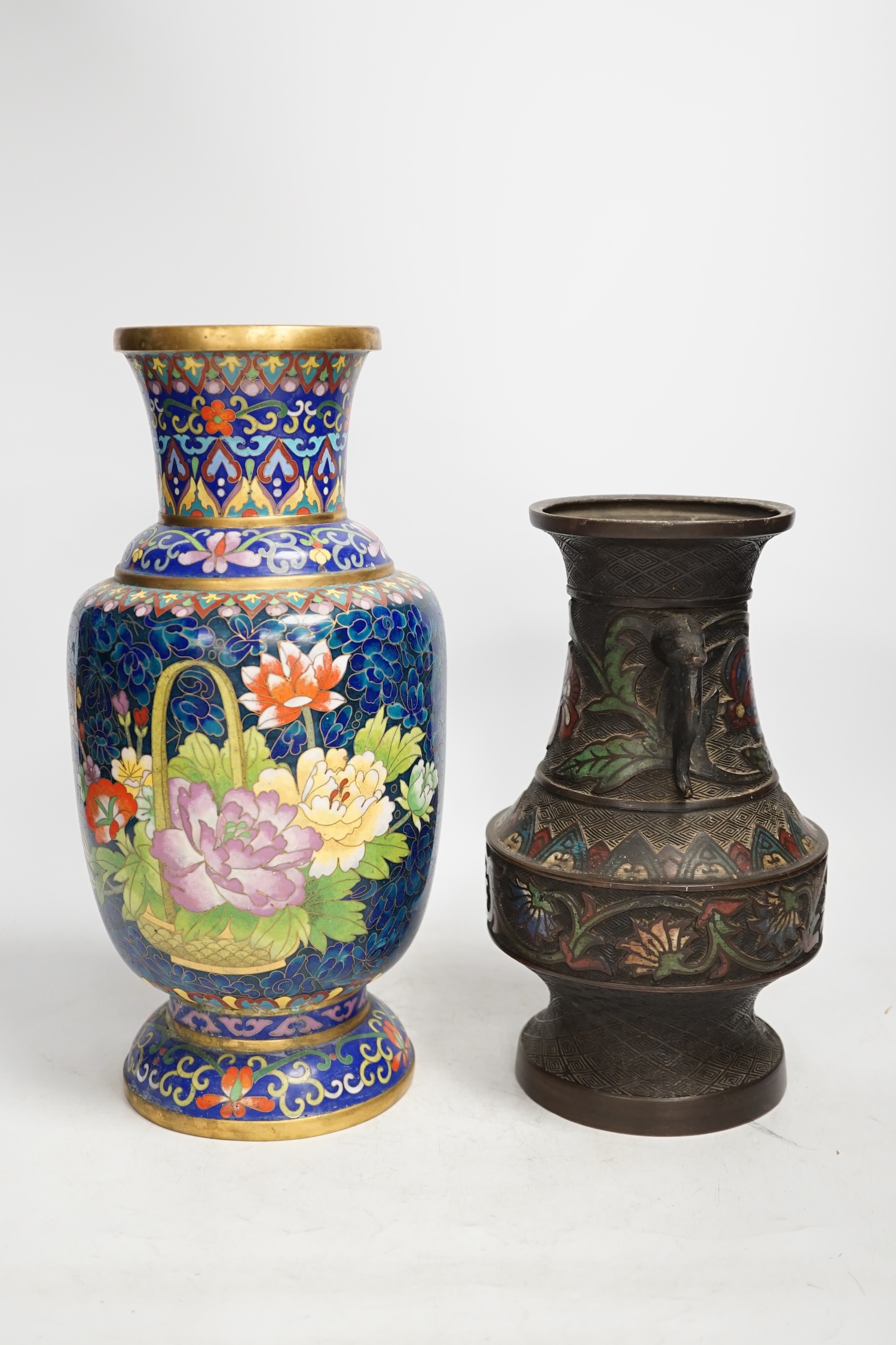 A Japanese bronze and champlevé enamel vase and a Chinese cloisonné enamel vase, Champlevé vase 24cm high. Condition - cloisonné vase dented, champlevé vase in good condition
